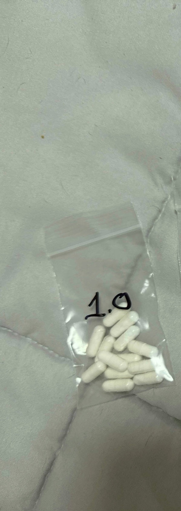 1 gram of 100 mg capsules